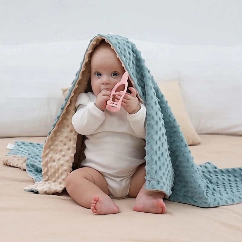 couverture bébé sous la couverture