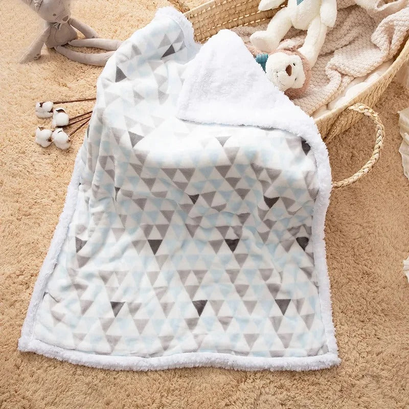 couverture bébé sur moquette