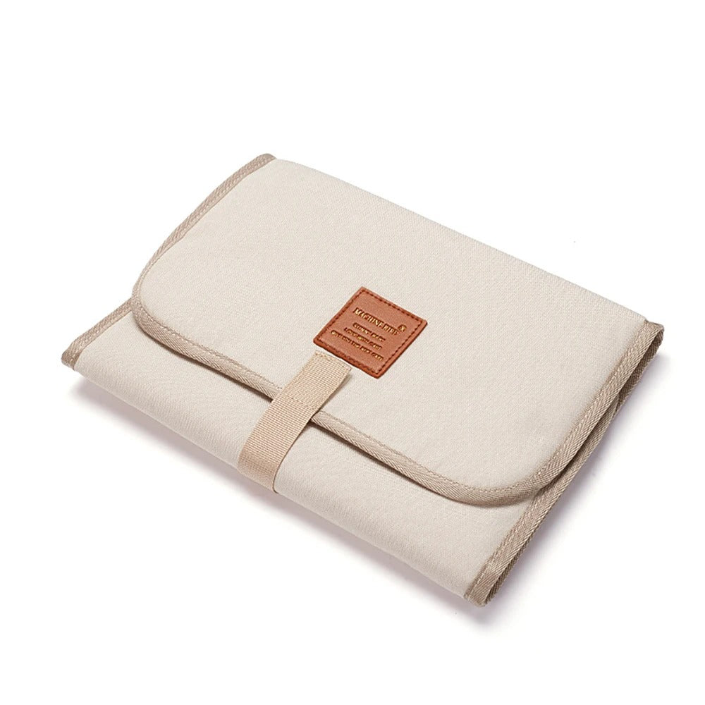 Tapis à langer nomade beige