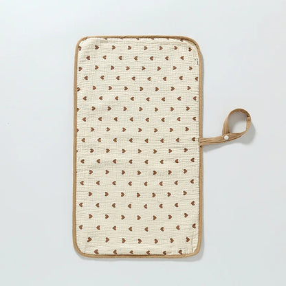 tapis à langer nomade coeurs