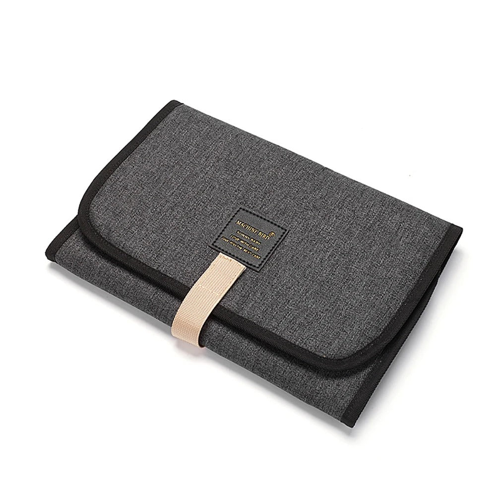 Tapis à langer nomade rose gris foncé