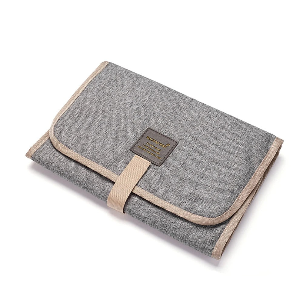 tapis à langer nomade gris