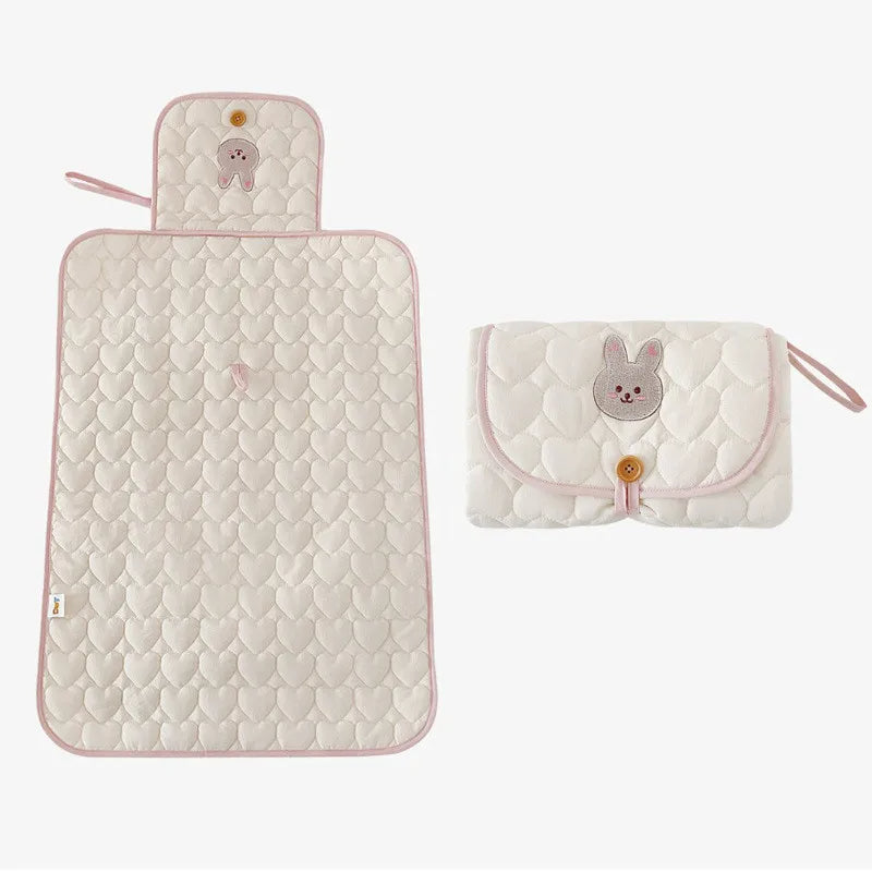 tapis à langer nomade lapin