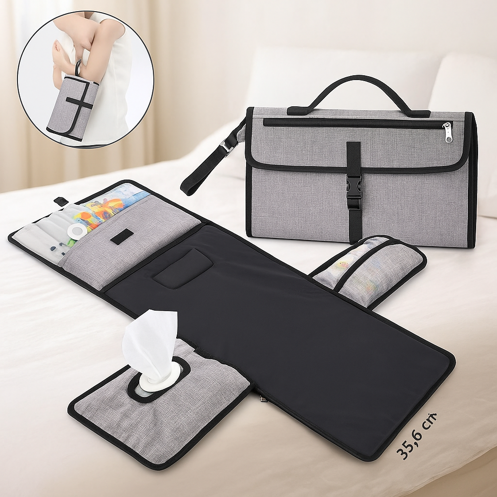tapis à langer nomade sur le lit